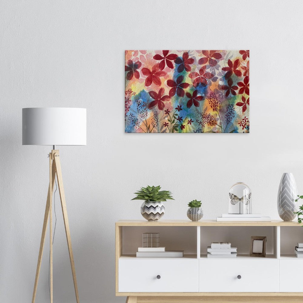 Red flowers colorful wall art canvas print hanging in a modern living room.