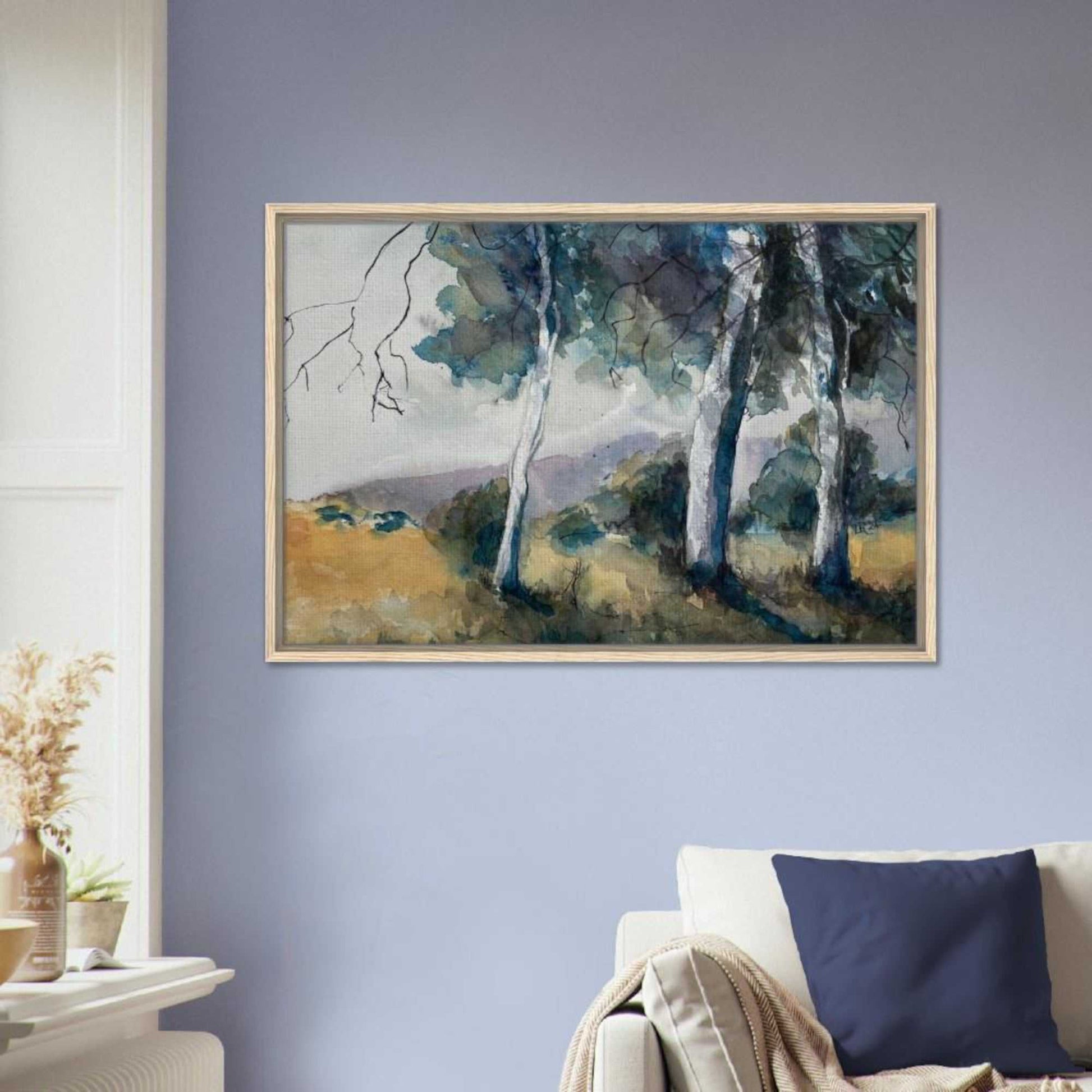 Australian watercolor landscape wall art framed canvas with gum trees and hills on a light blue wall, ready-to-hang.